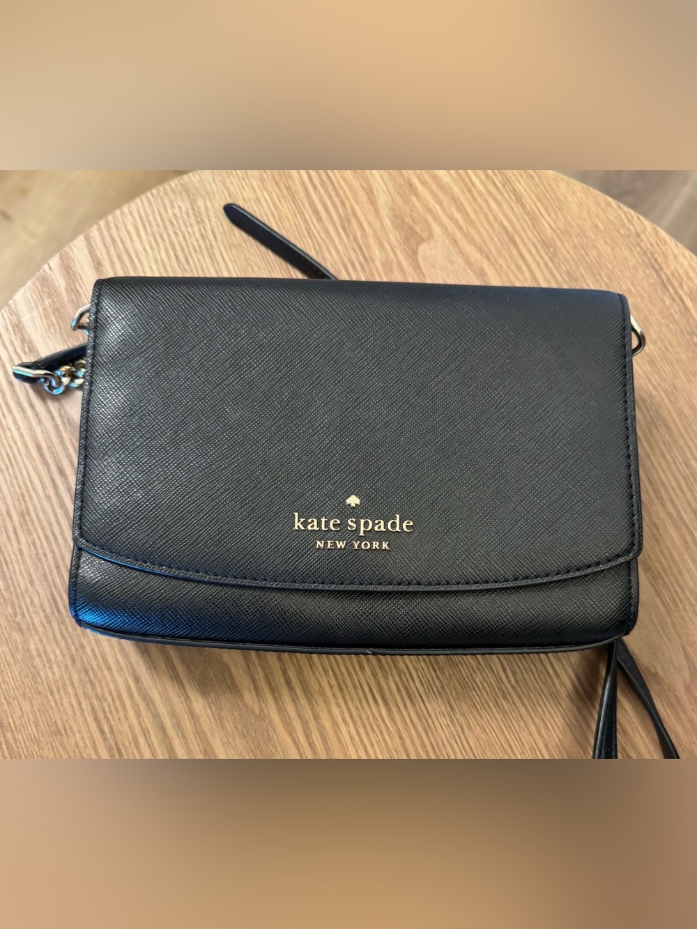 kate spade black leather flap crossbody with gold logo
